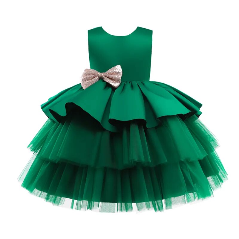 layered holiday green dress with accent bow